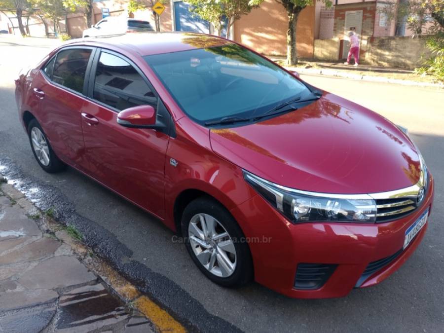 TOYOTA - COROLLA - 2014/2015 - Vermelha - R$ 77.000,00